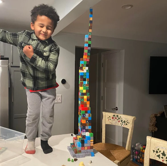 Four dynamic KidsCraft play scenes: children connect magnetic cubes and build their own worlds together.